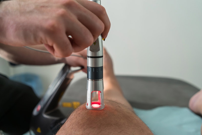 Laser therapy for knee pain management